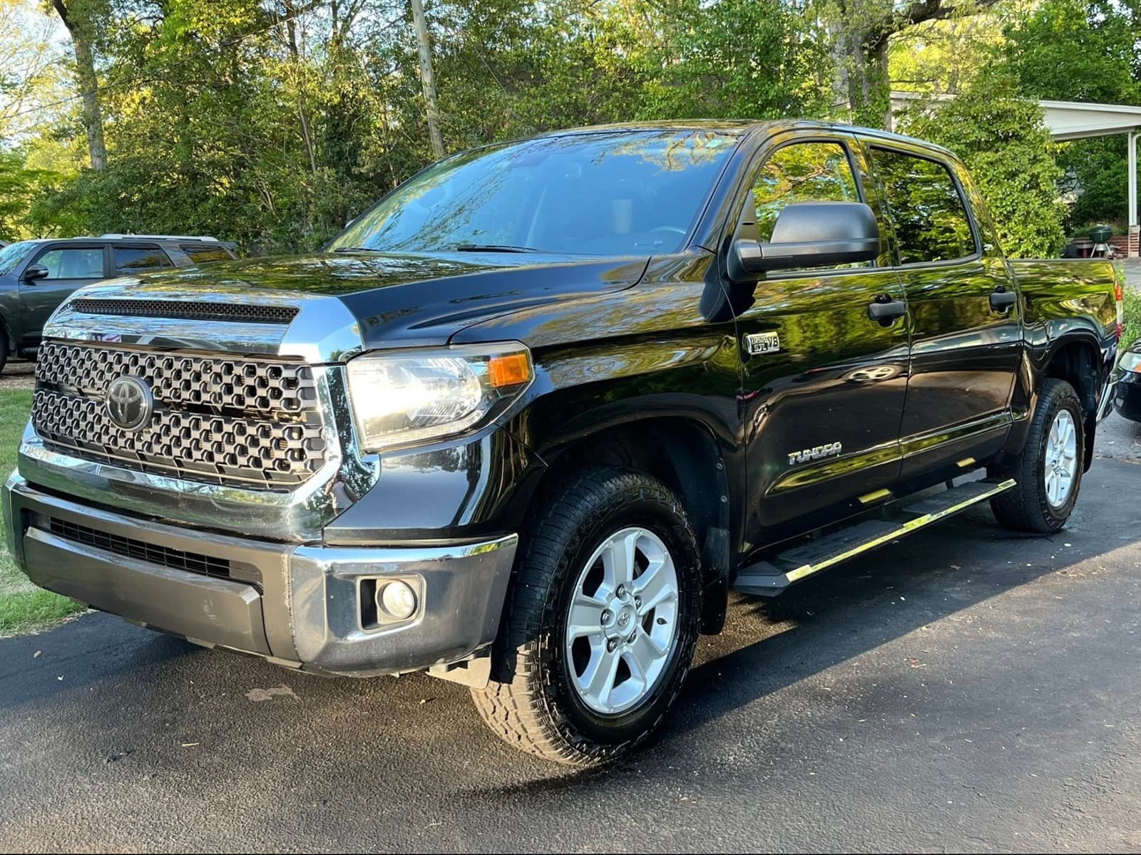 Toyota Tundra exterior after mobile hand wash and sealant — deep gloss black paint